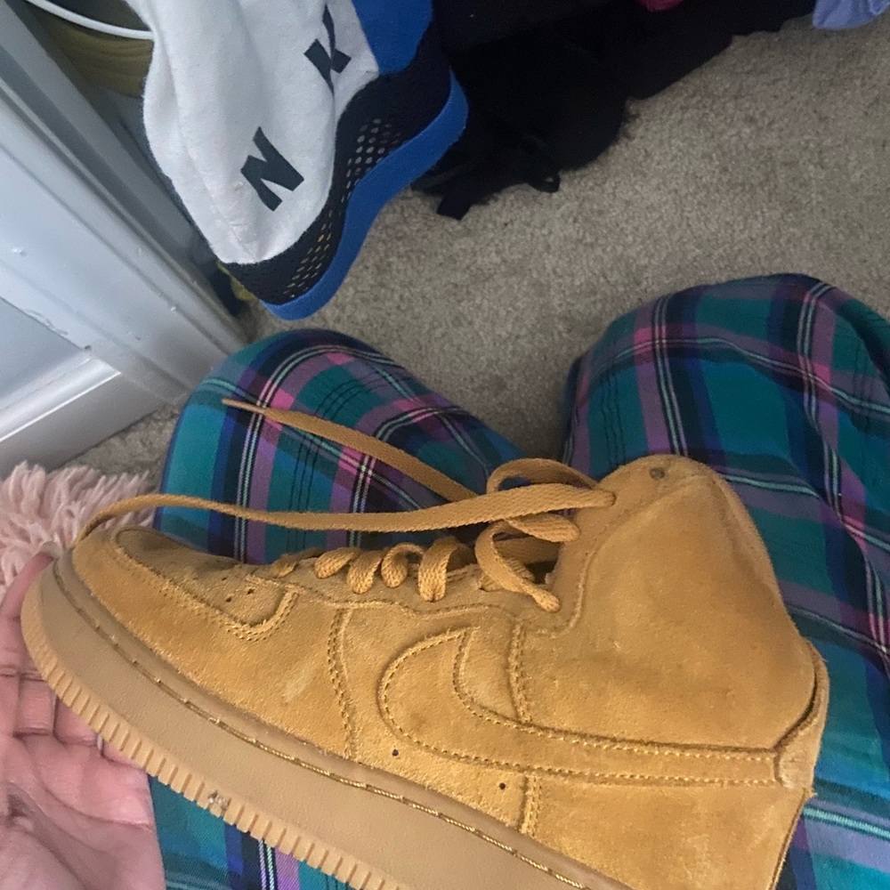 beige high top nikes